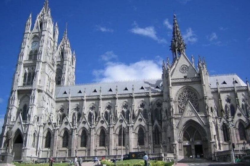 A Gothic cathedral with twin spires and a large rose window. 1