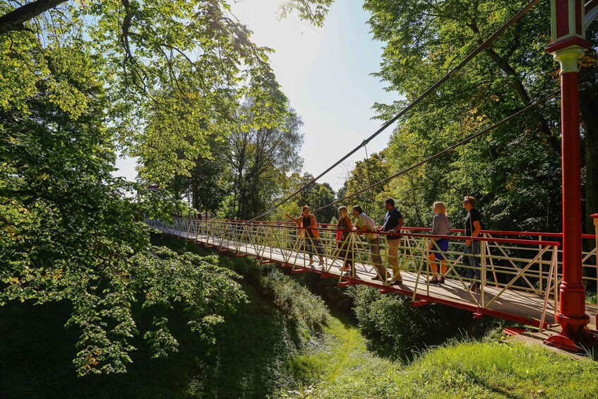 A suspension bridge with pedestrians. 4