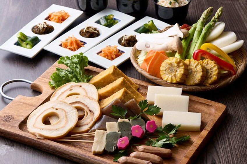 A wooden board with sliced bread, cheese, and herbs. 4