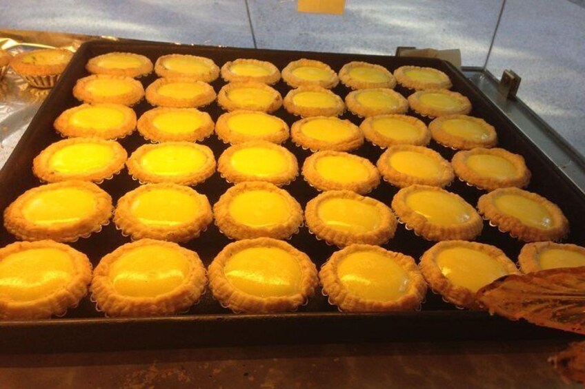 A tray of custard tarts. 3