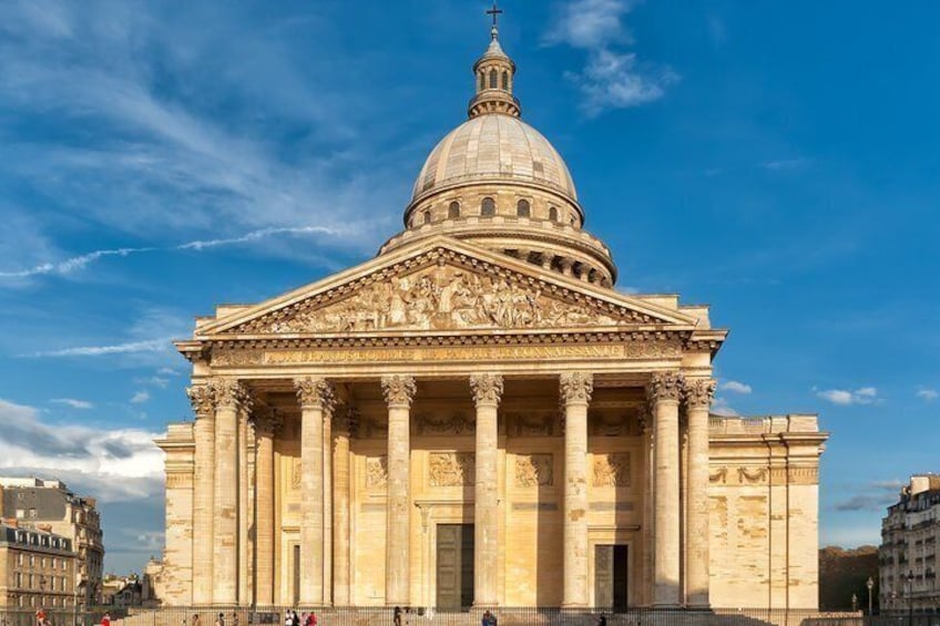 A large classical building with a dome and columns, likely a government or historical building. 1