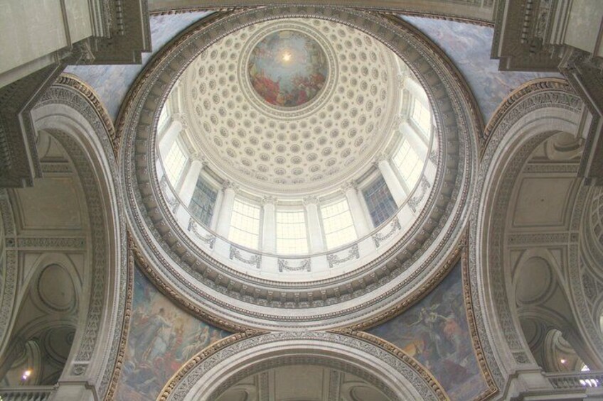 A grand architectural dome with intricate patterns and a central skylight. 5