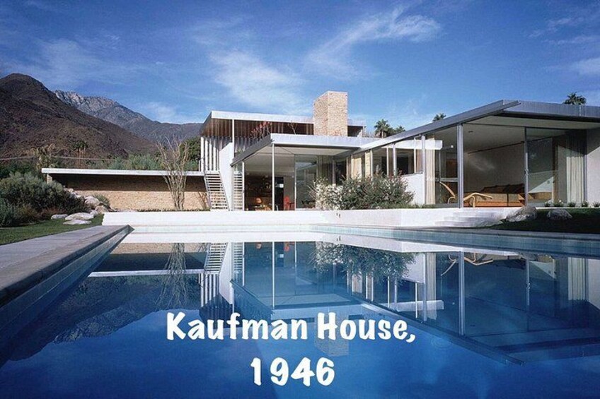 A modern house with a pool, surrounded by mountains. 3