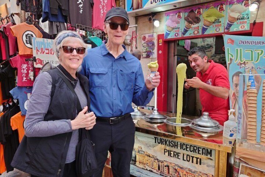 A street vendor selling Turkish ice cream. 5