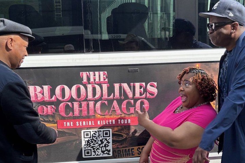 A bus with a sign that reads 'The Bloodlines of Chicago' and a QR code. 4