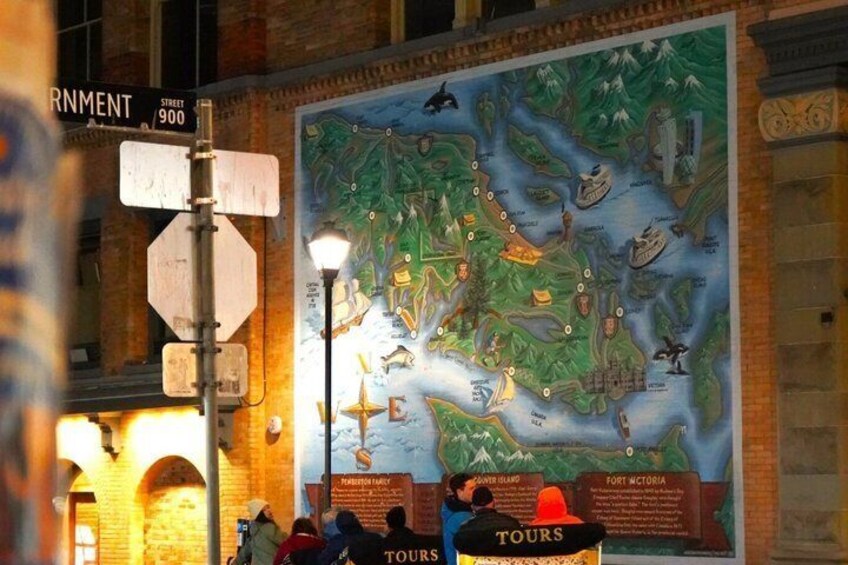 A large mural of a map with landmarks and tours. 2