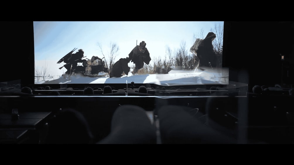 Soldiers in winter gear on a snow-covered field. 5