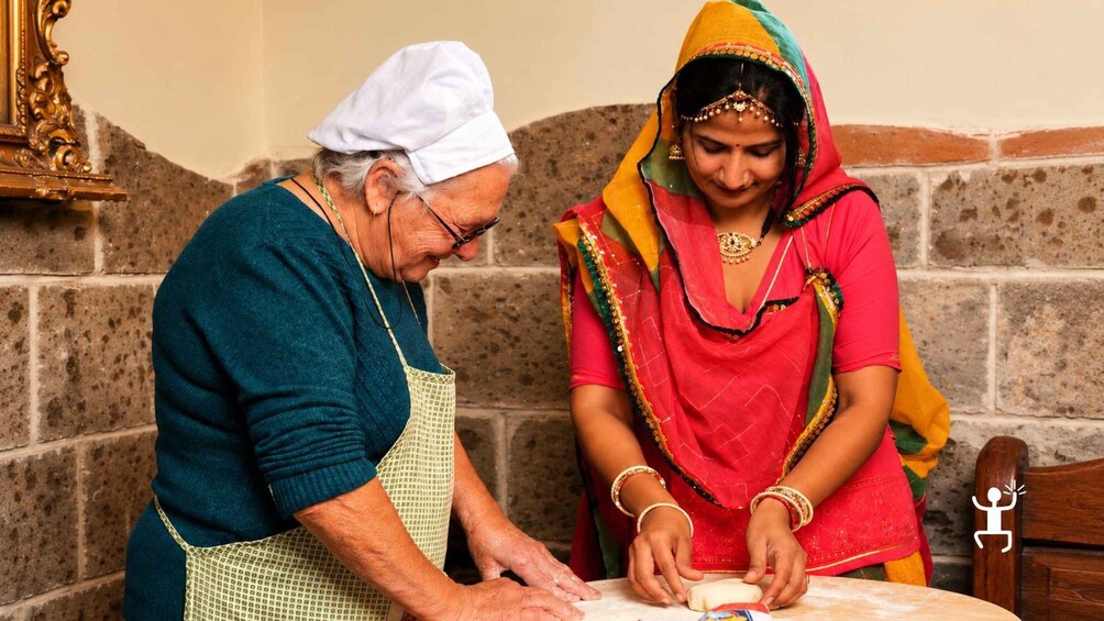 An elderly man and a woman preparing food together. 5