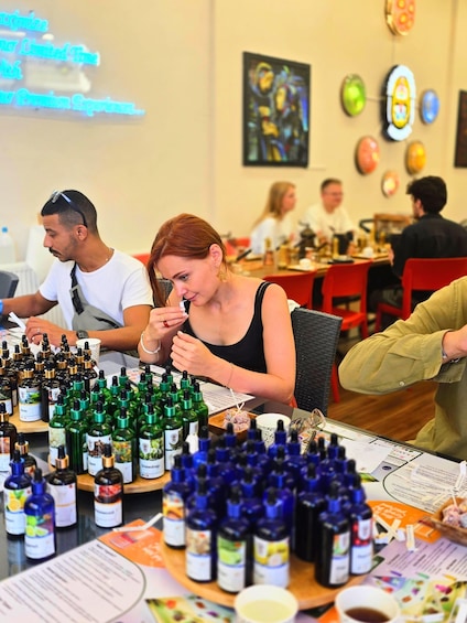 A tasting event with people sampling various products. 1
