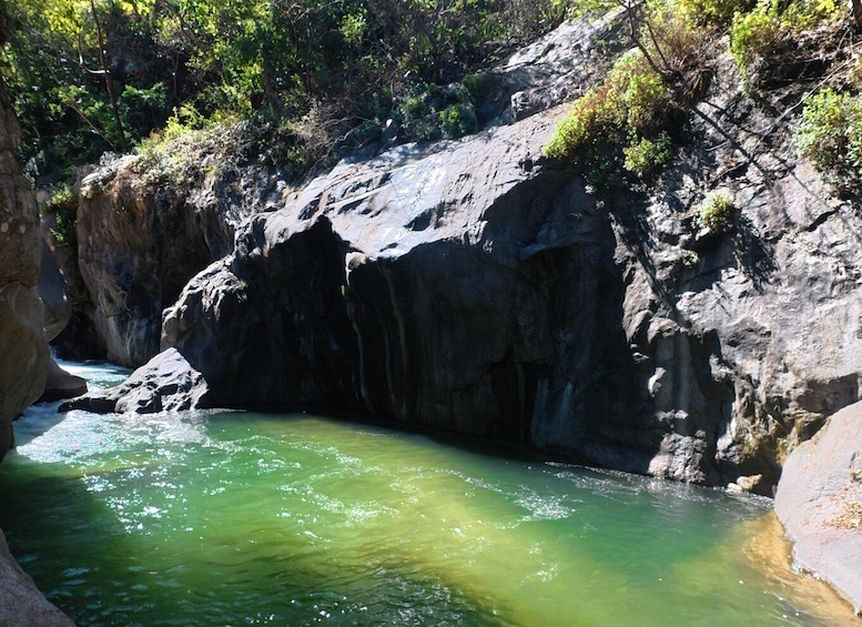 A rocky gorge with a clear stream. 1