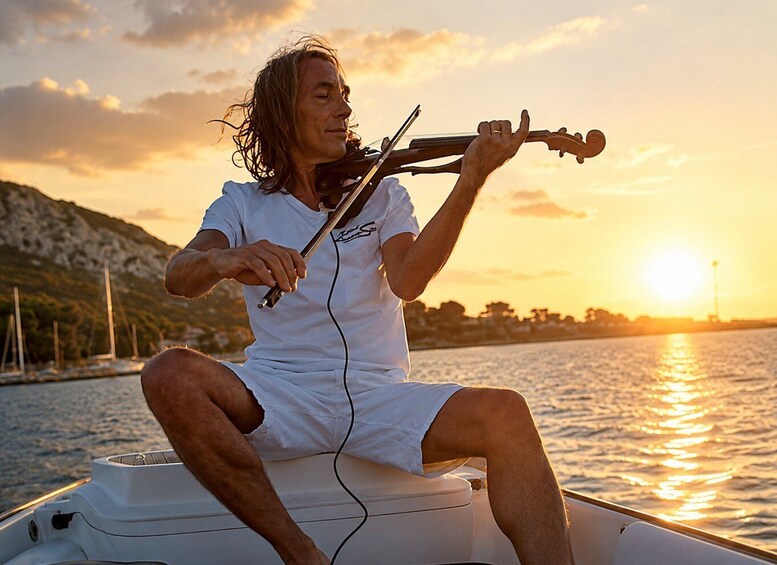 Cagliari: Boat tour, Aperitif under the Sella, Serenade with Violinist 1