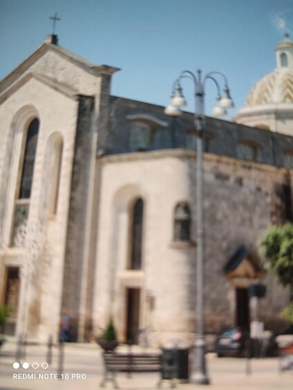 A church with a dome and a bell tower. 3