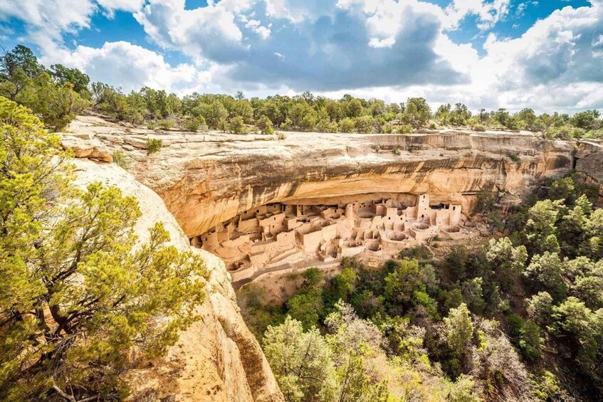 A cliffside with ancient cliff dwellings. 1