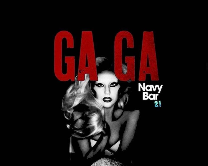 A person with a metallic object, text reading 'GA GA' and 'Navy Bar 21'. 1