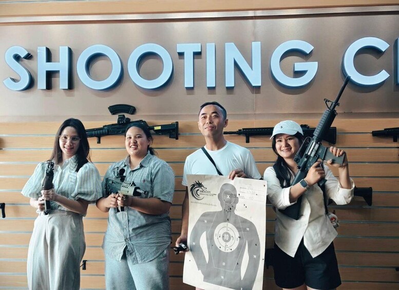 A shooting range with targets and firearms. 4