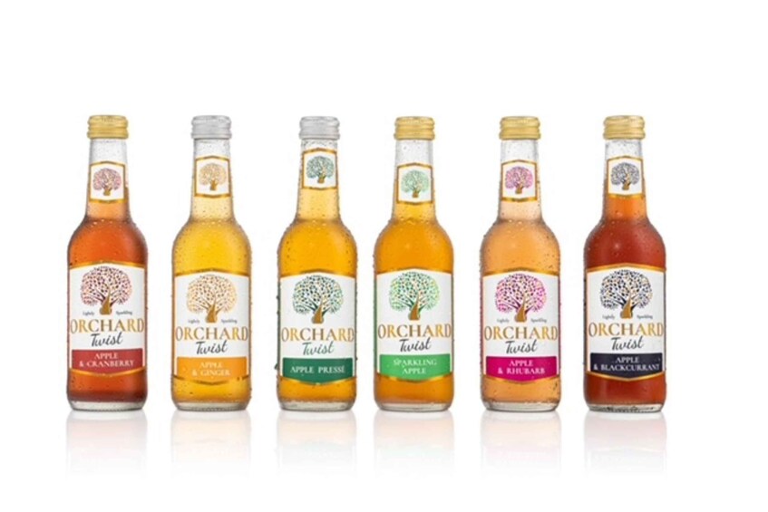 Six bottles of Orchard Twist cider with different flavors. 4