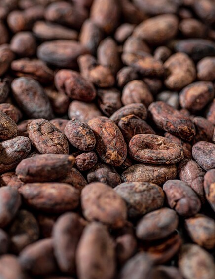 A close-up of roasted coffee beans. 3