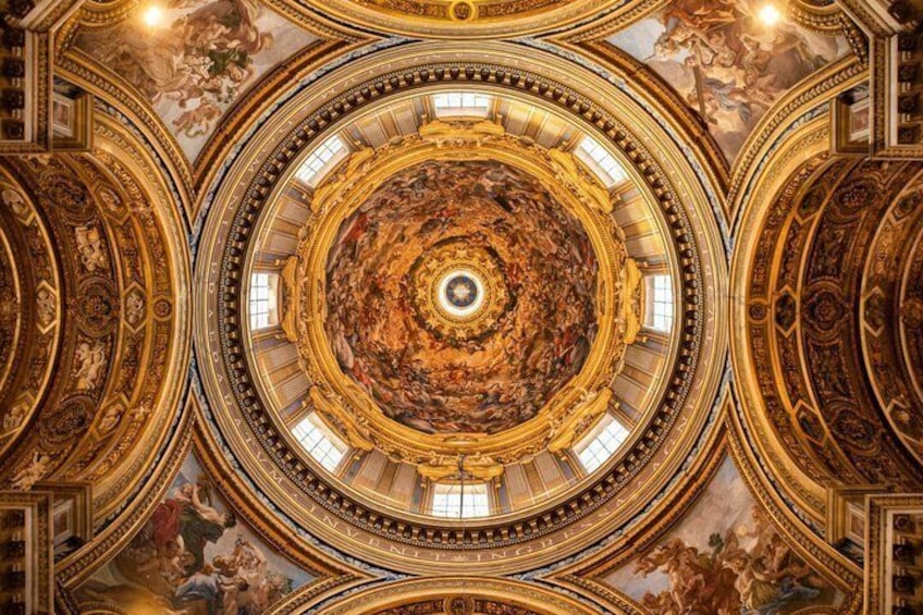 A grand, ornate ceiling with intricate frescoes and gold accents. 3