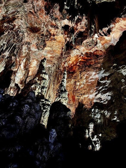 A cave with stalactites and stalagmites. 5