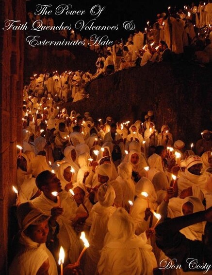 A group of people in white robes holding candles in a dimly lit cave. 4