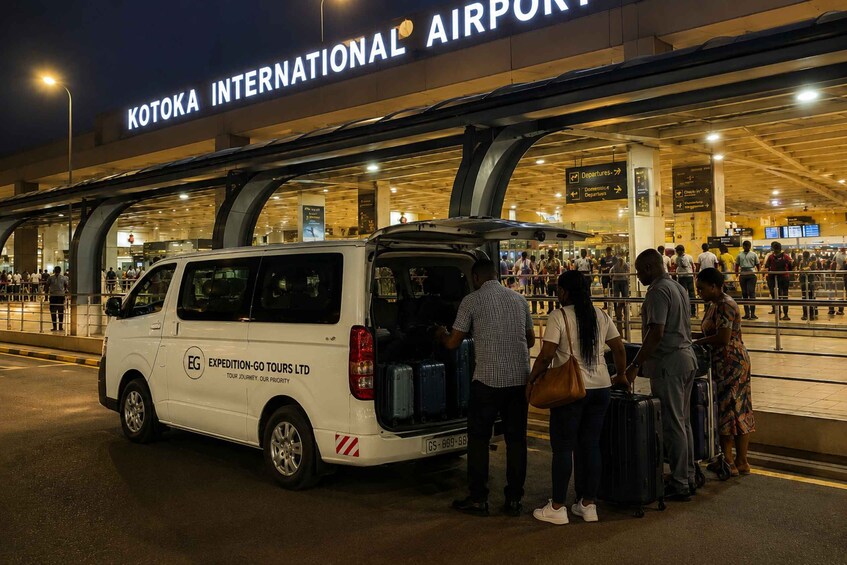 A white van with luggage at Kotoka International Airport. 3
