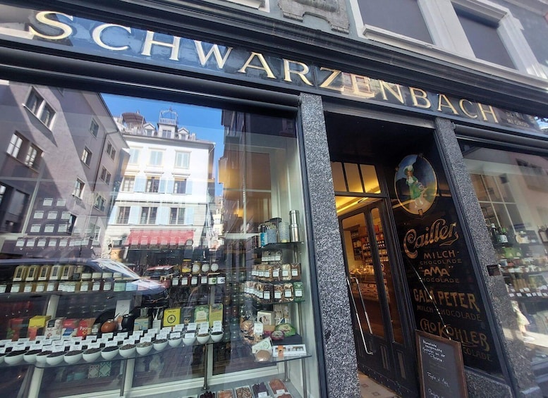 A store named Schwarzenbach with a display of chocolates and coffee. 1