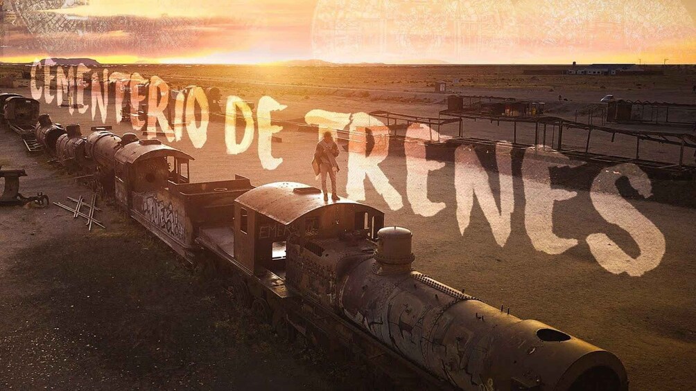 A vintage steam locomotive with the text "CENOTERIO DE TRENES" on the side, set in a desert landscape with a sunset in the background. 3
