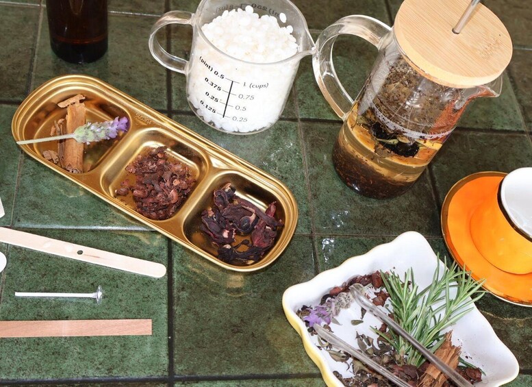 A kitchen counter with various cooking ingredients and utensils. 3