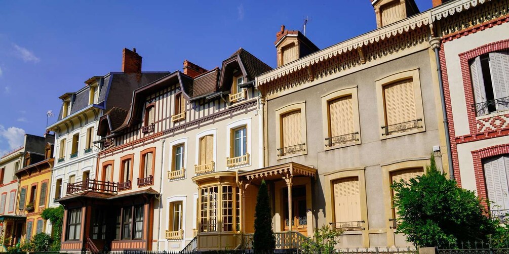 A row of colorful European-style buildings with distinct architectural details. 3