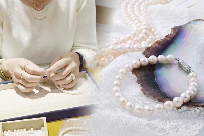 A person handling pearls, with a large abalone shell and pearl necklaces. 1