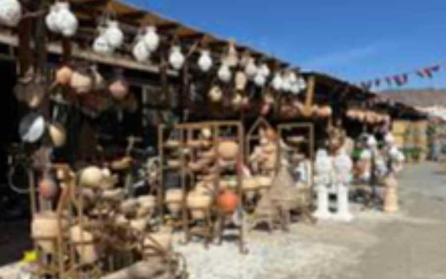 A market stall with various items on display. 4