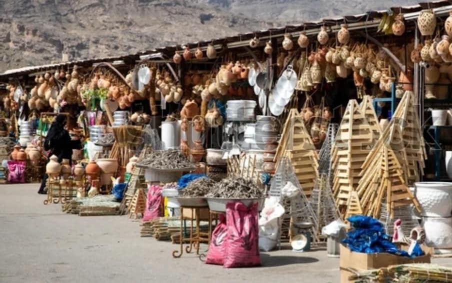 A market stall with pottery and woven baskets. 2