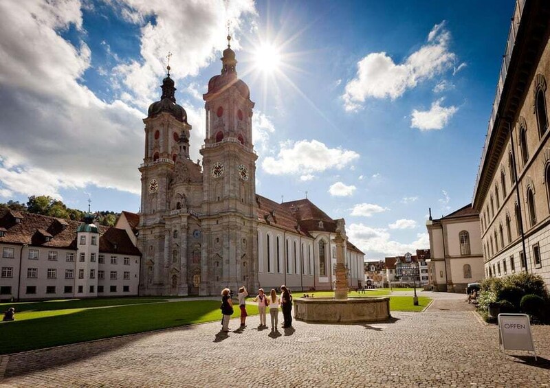 A historic church with two towers and a clear sky. 3
