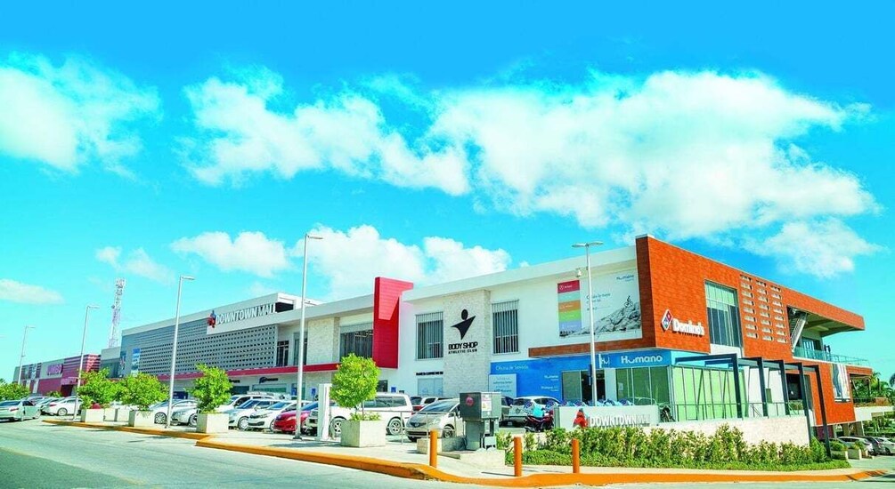 A commercial area with a building labeled 'Downtown Mall' and 'Dunkin' Donuts'. 5