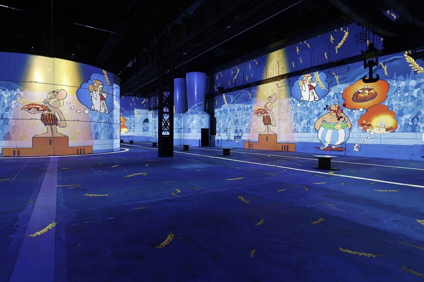 A large indoor space with murals of animated characters on the walls. 5