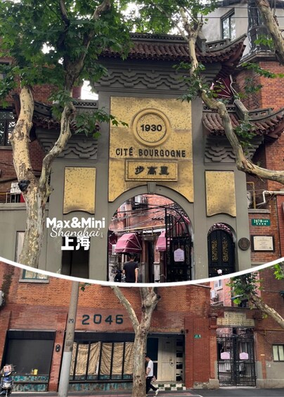 A traditional Chinese building with a sign reading '1930 CITÉ BOURGOGNE' and a tree in front. 5