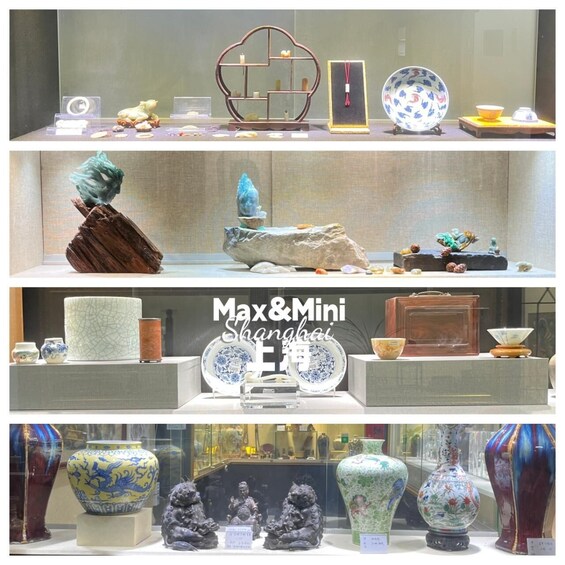A display of various ceramic and porcelain items, including vases, bowls, and figurines, arranged on shelves. 1