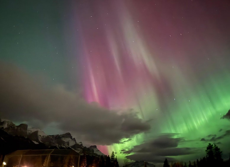 The aurora borealis over a mountainous landscape. 4