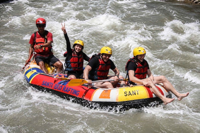 A group of people rafting on a river. 2