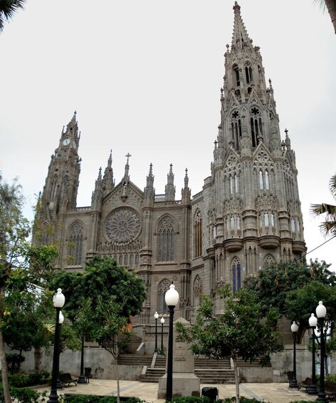 A Gothic-style cathedral with intricate spires and a large rose window. 4