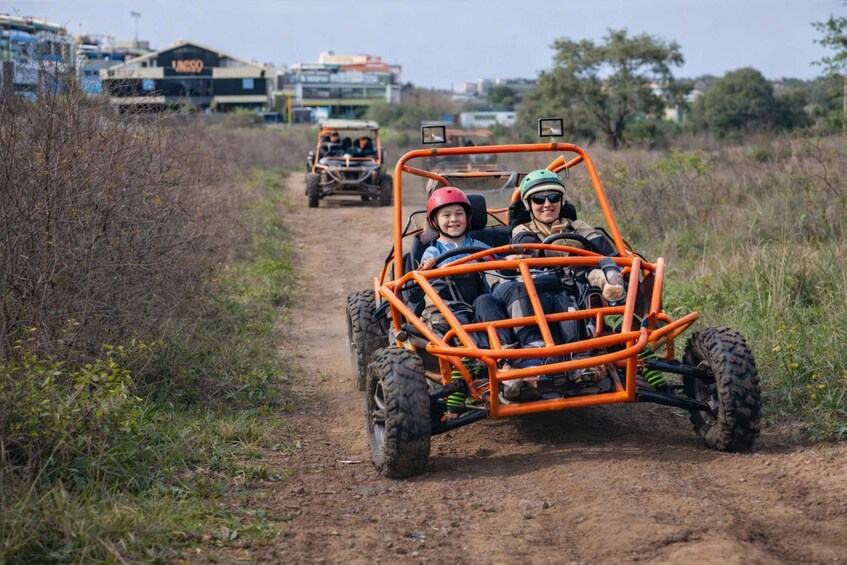 A dirt path with off-road vehicles. 3