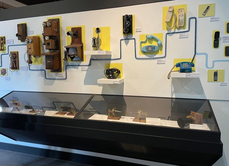 A museum exhibit of vintage communication devices. 2