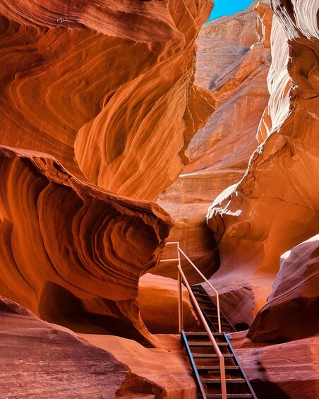 A canyon with a wooden staircase leading down. 2