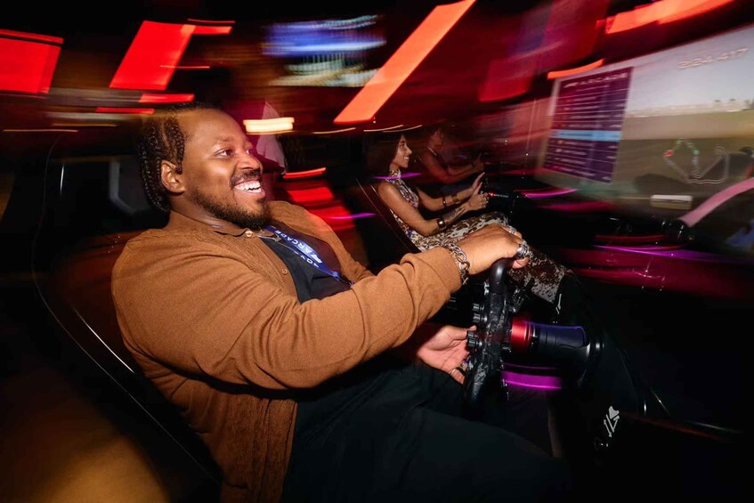 A person driving a car with a dashboard displaying a navigation system. 2