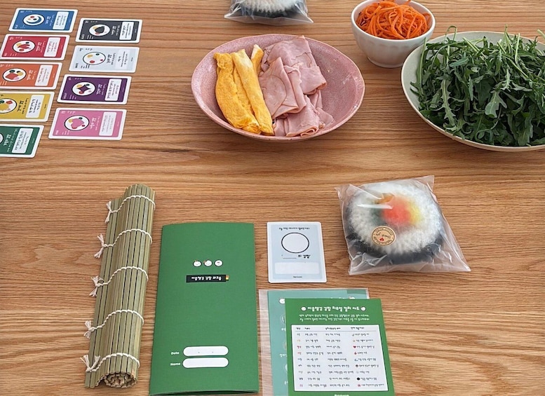 A meal setup with food items, cards, and a calendar. 4