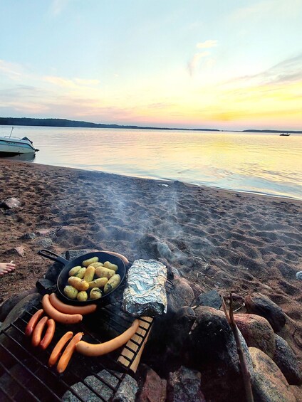 Picture 9 for Activity Tampere: Lake Fishing Experience with boat and Campfire Meal 2