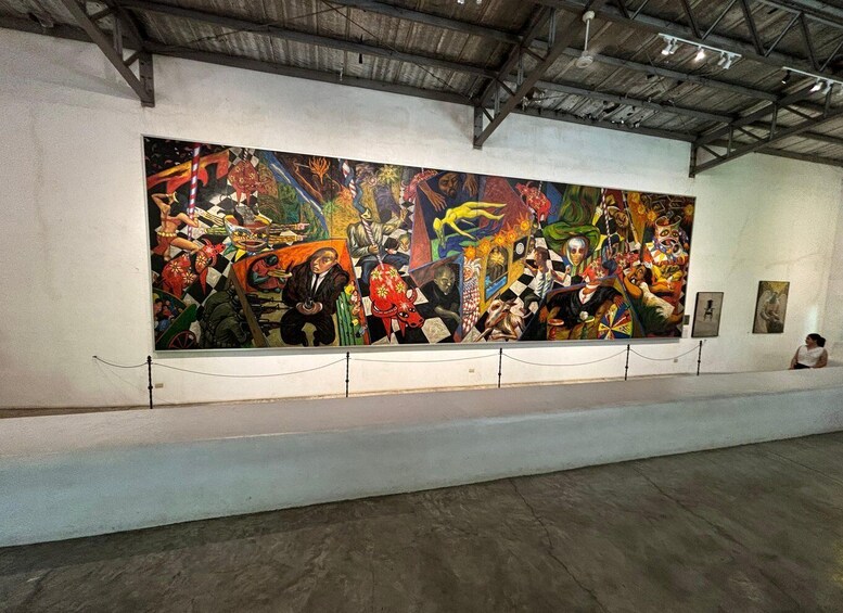 A large abstract painting in an art gallery. 1
