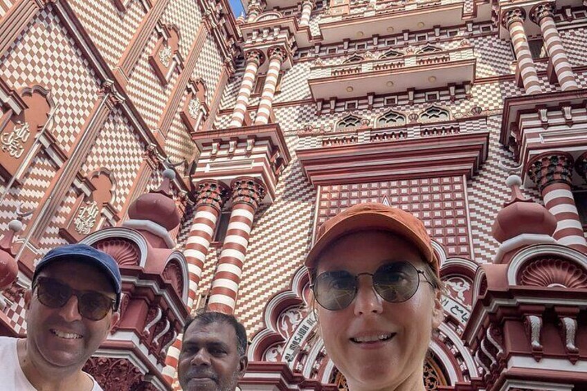 A building with intricate architectural details, including arches and columns. 5