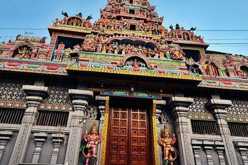 A temple with intricate carvings and statues. 4