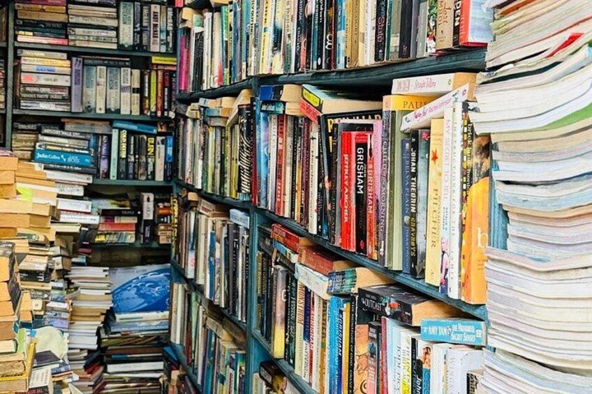 A bookshelf filled with various books. 3